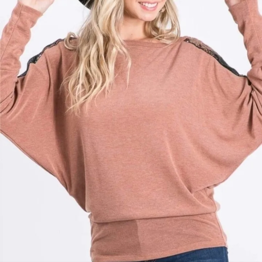 Gorgeous dolman sleeve top with sequins and glitter shine. Nwot.